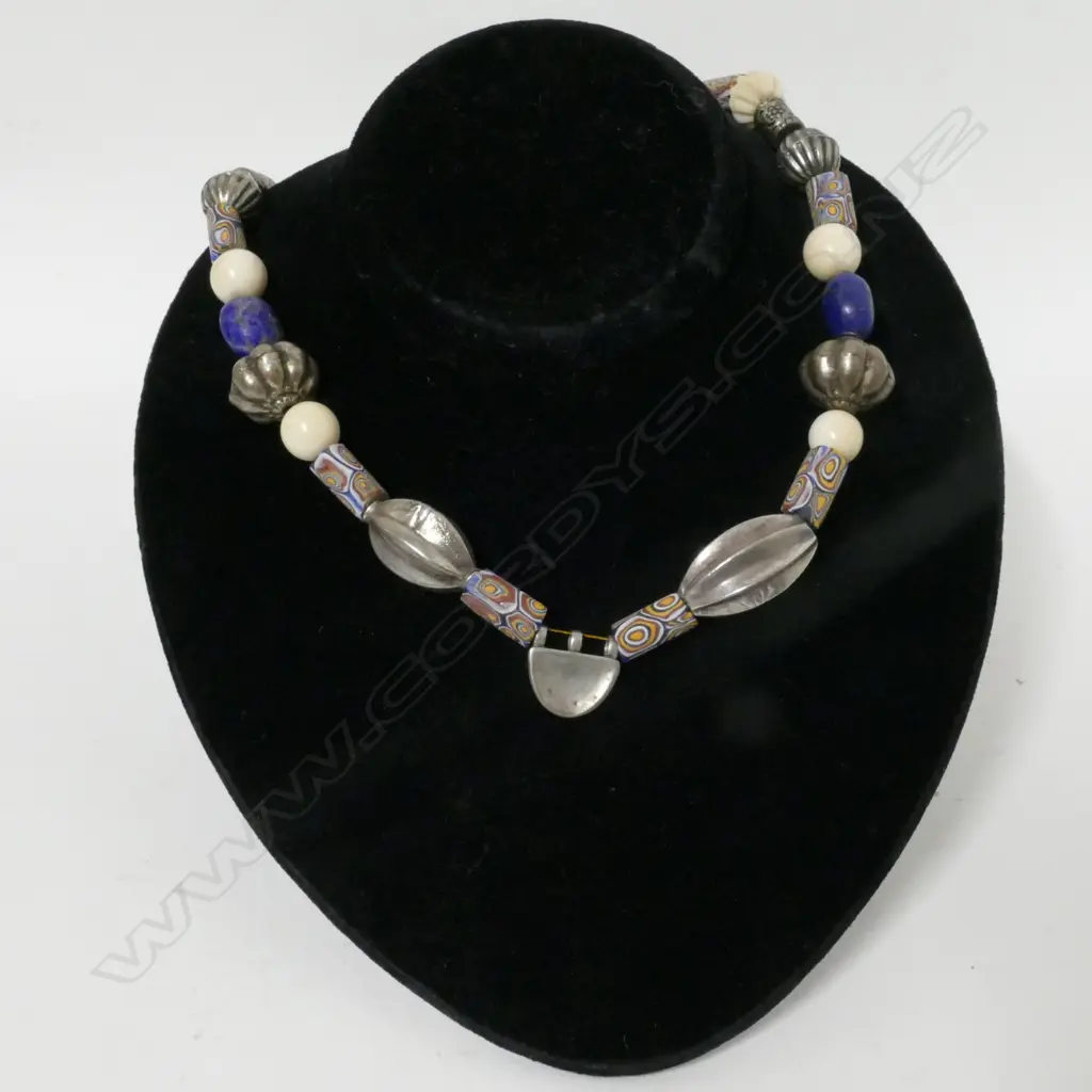 A tribal bead and silver necklace Image 1++