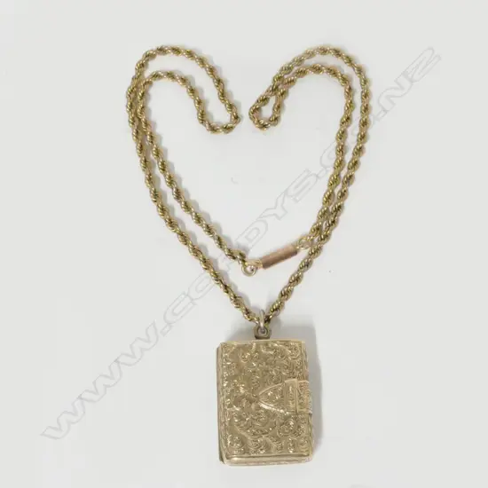 An Edwardian 9ct. gold photo locket and chain