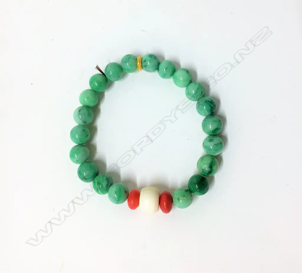 A jadeite and precious bead bracelet Image 1++