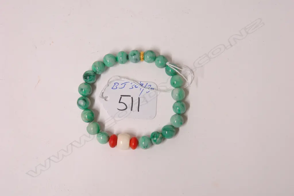 A jadeite and precious bead bracelet Image 1++