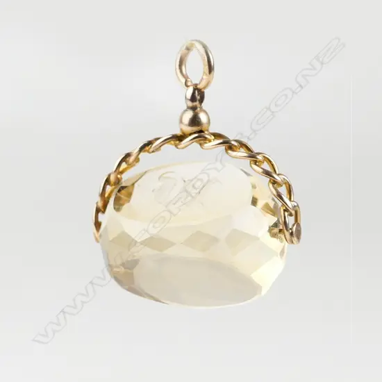 A 9ct. gold and citrine fob spinner