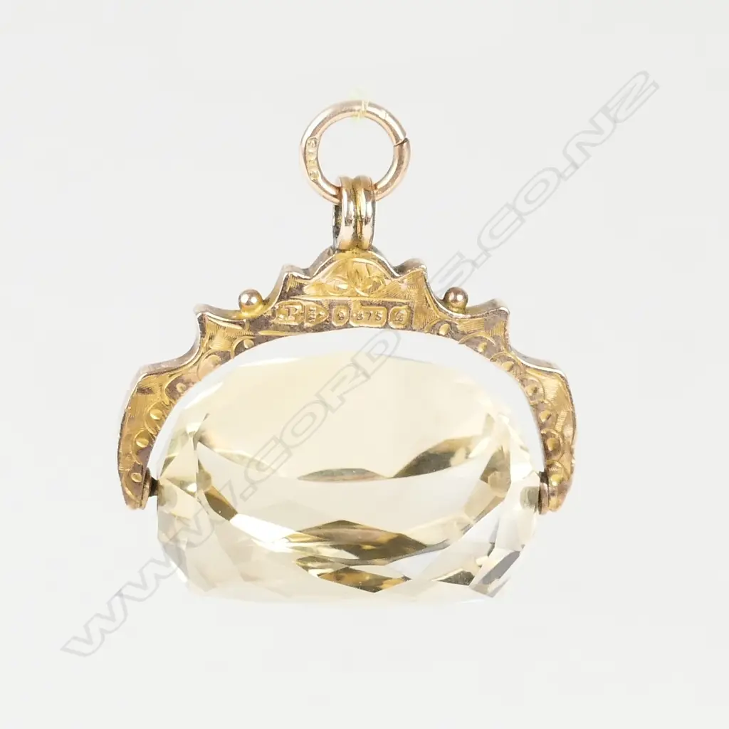 A 9ct. rose gold and citrine fob spinner Image 1++