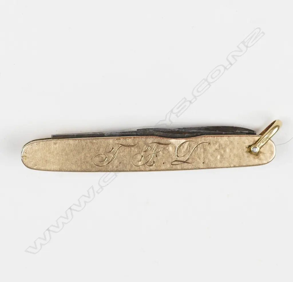A 14ct. gold pocket knife Image 1++