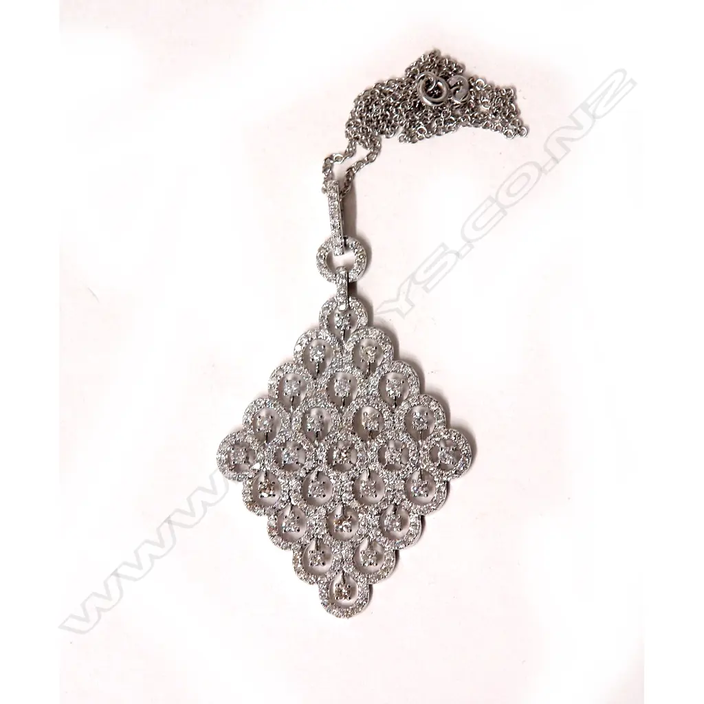 A lady's modern 18ct. white gold and large diamond set pendant necklace Image 1++