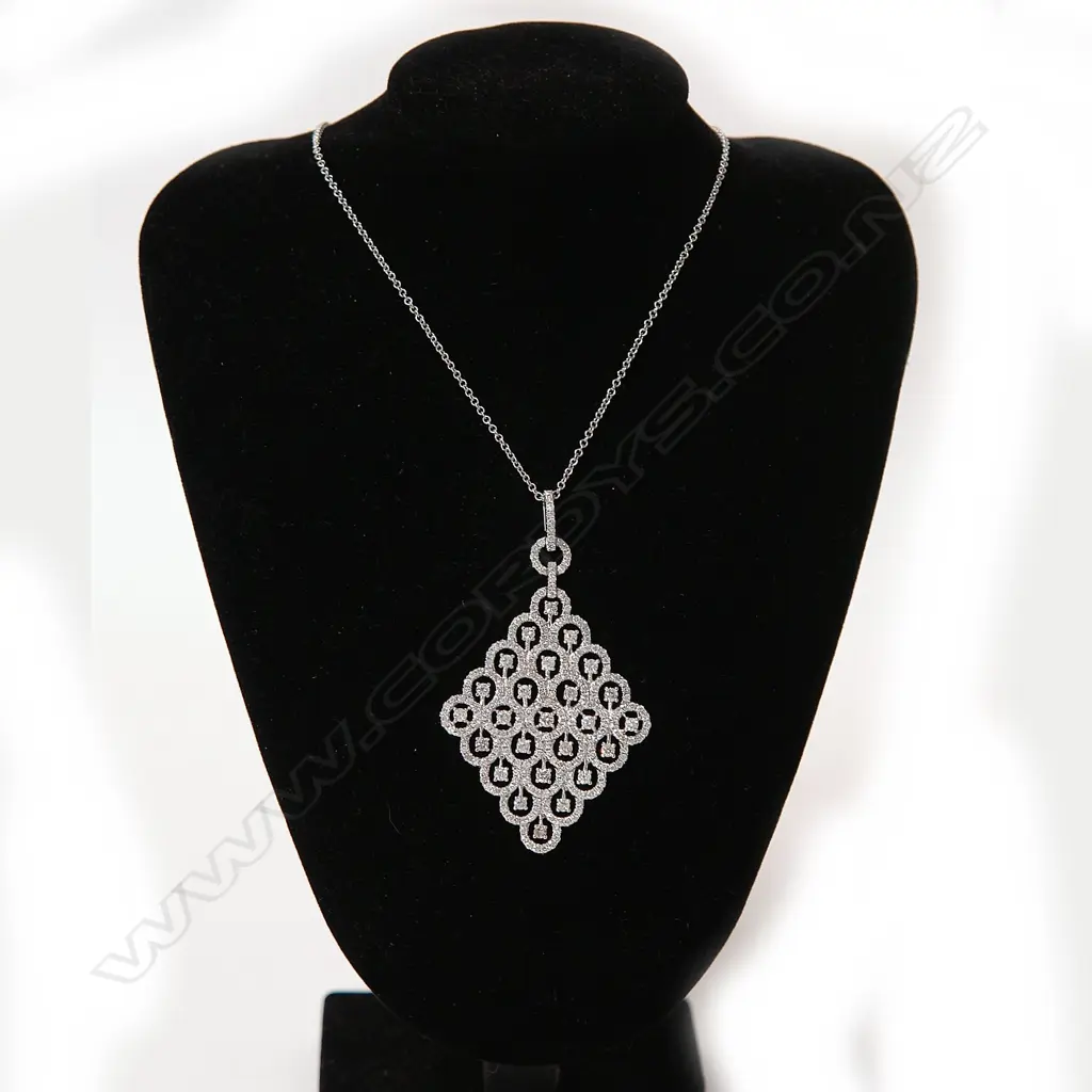 A lady's modern 18ct. white gold and large diamond set pendant necklace Image 1++