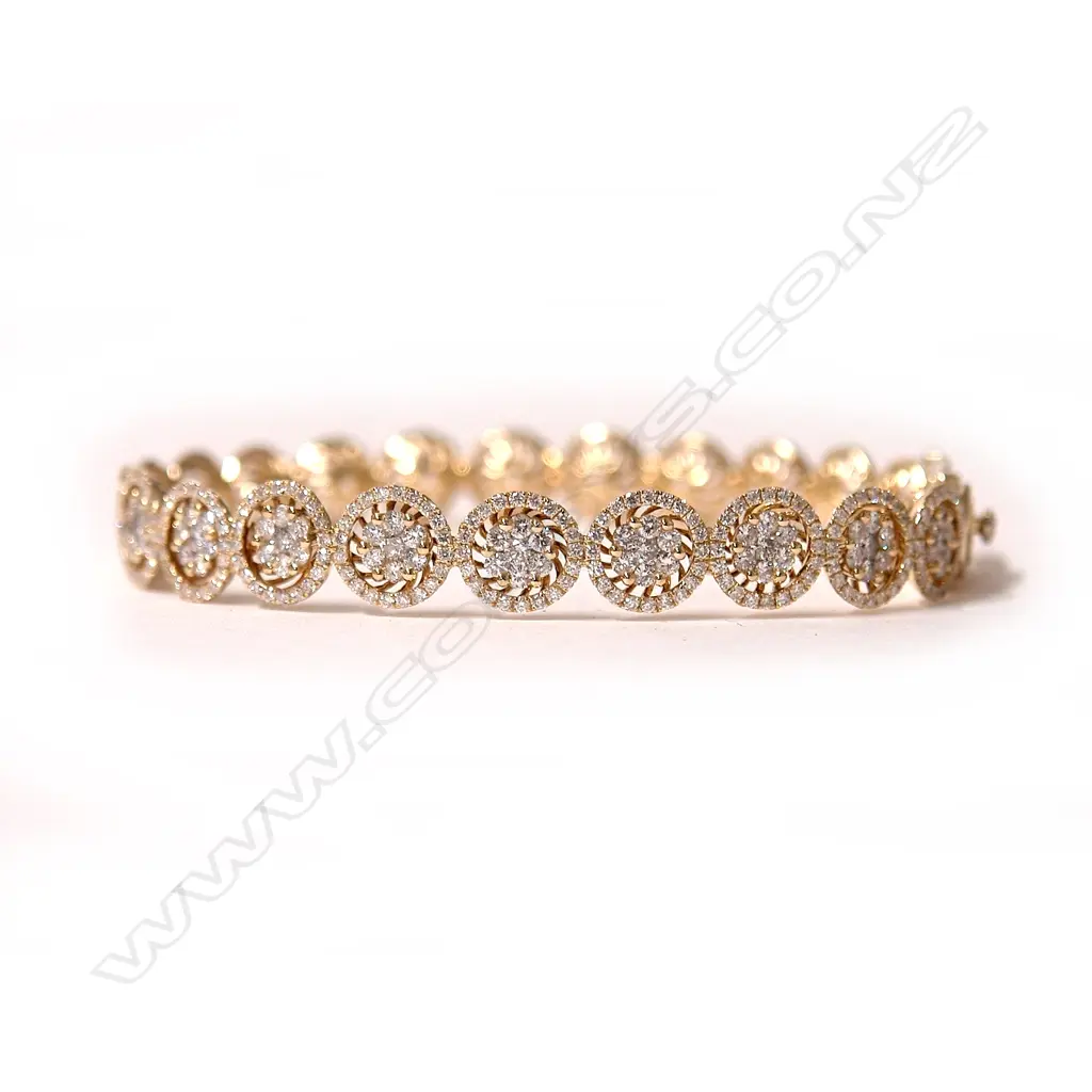 An 18ct. yellow gold and diamond set bracelet Image 1++