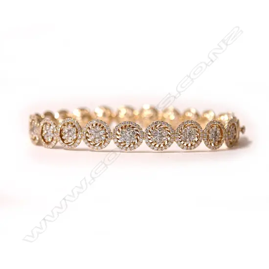 An 18ct. yellow gold and diamond set bracelet