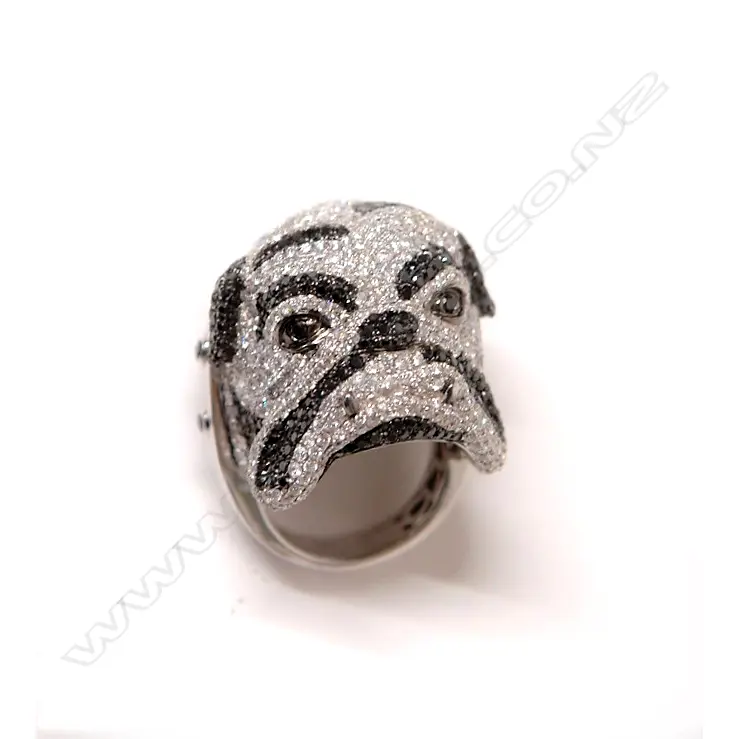An impressive designer modern 18ct. white gold and diamond set dog head ring Image 1++