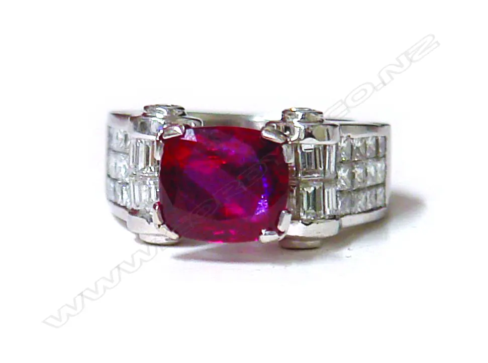 An impressive 4.01ct natural ruby and diamond substantial 18ct. gold and platinum dress ring Image 1++