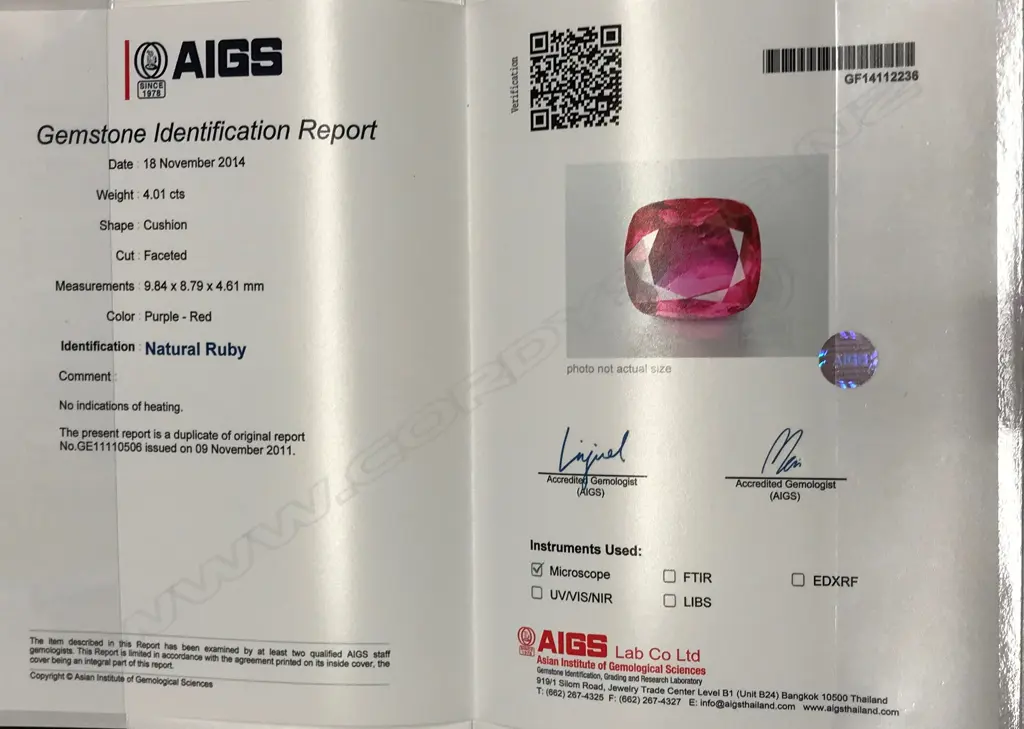 An impressive 4.01ct natural ruby and diamond substantial 18ct. gold and platinum dress ring Image 1++