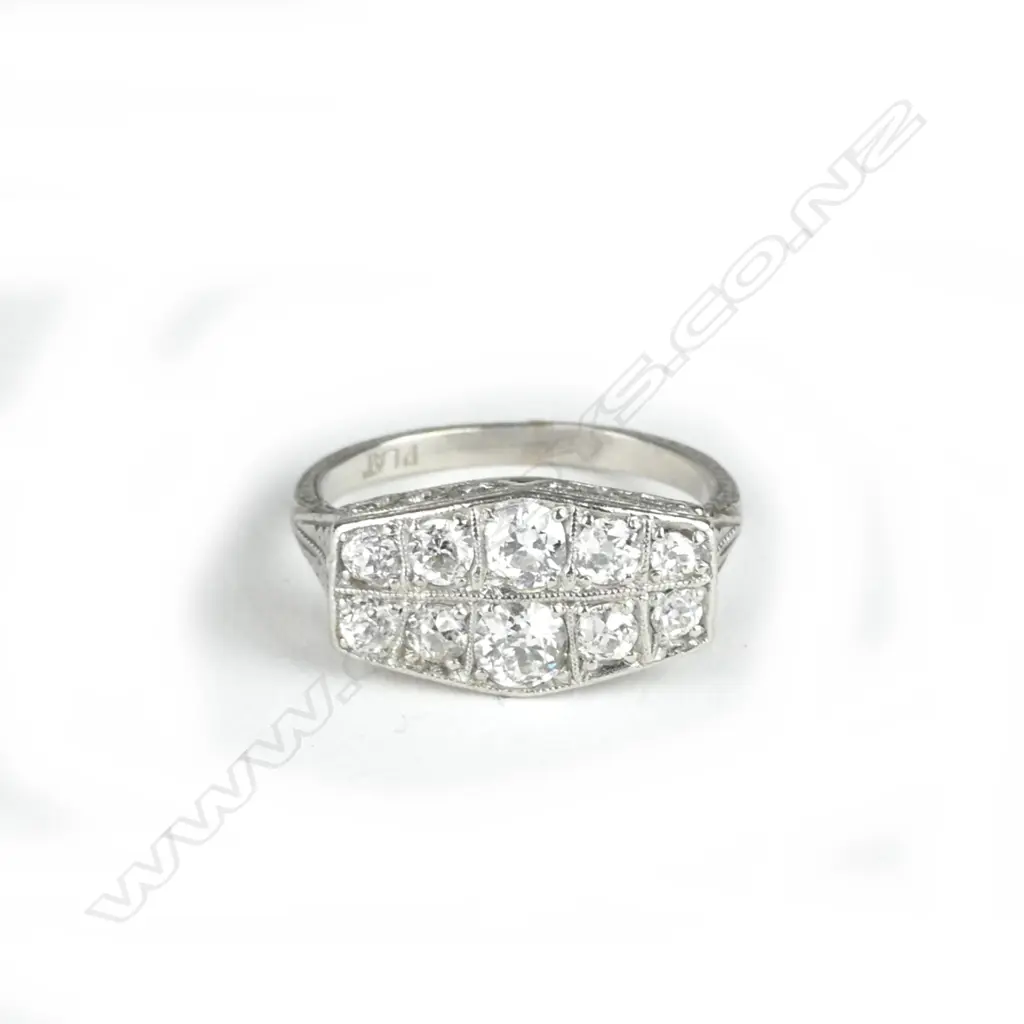 An Art Deco platinum and diamond cluster ring Image 1++