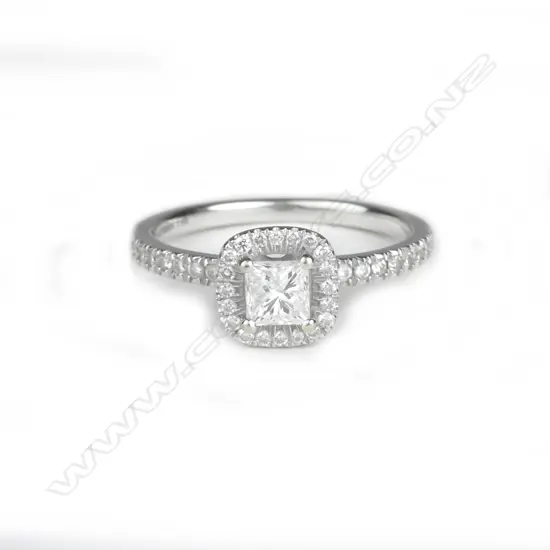 A 14ct. white gold and diamond ring