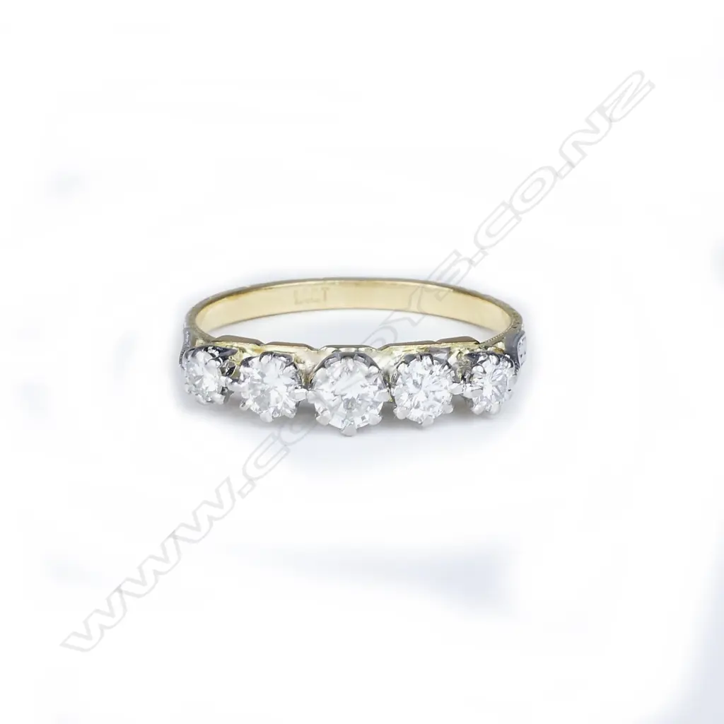 An estate 18ct. gold and five-stone diamond ring Image 1++