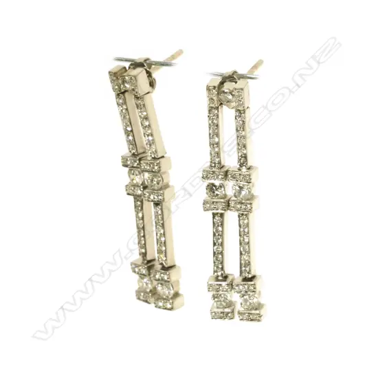A pair of 18ct. white gold and diamond drop earrings