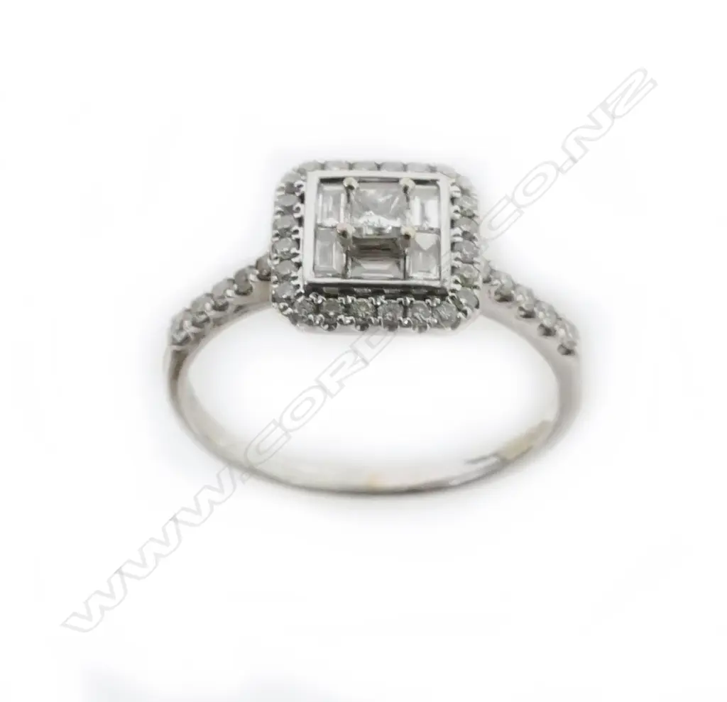 An 18ct. white gold and diamond ring Image 1++