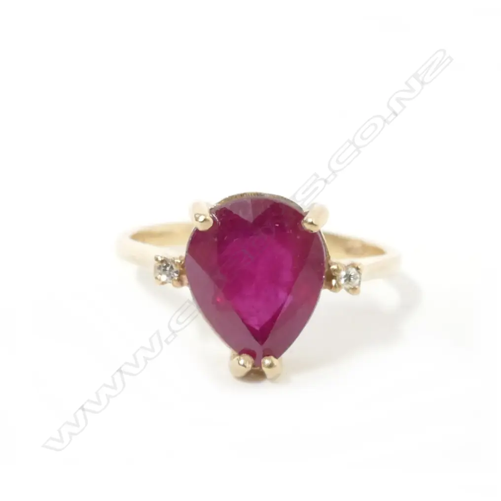 A 9ct. gold ruby and diamond ring Image 1++