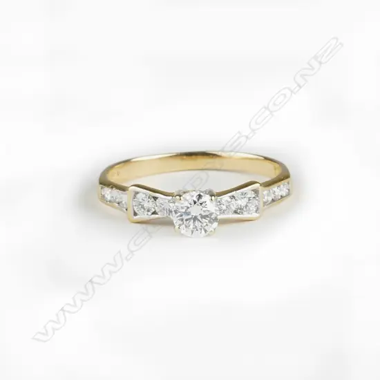 An 18ct. gold and diamond ring