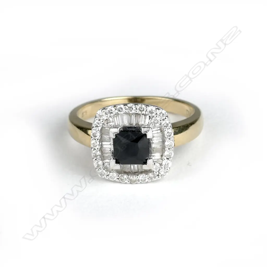 A 9ct. gold diamond and sapphire ring Image 1++