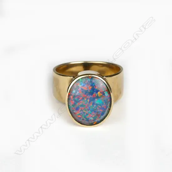 A retro 9ct. gold and opal ring