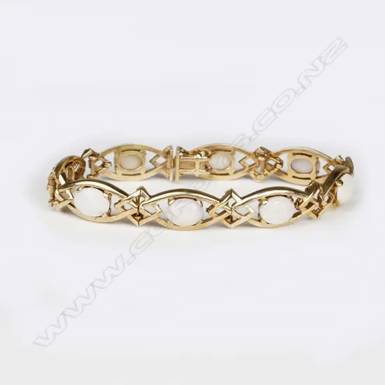 A 9ct. gold and opal bracelet