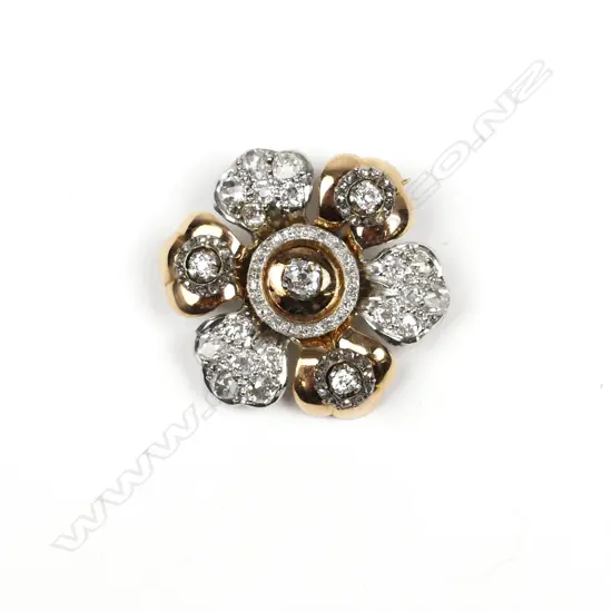 An estate 18ct. gold platinum and diamond Victorian style brooch