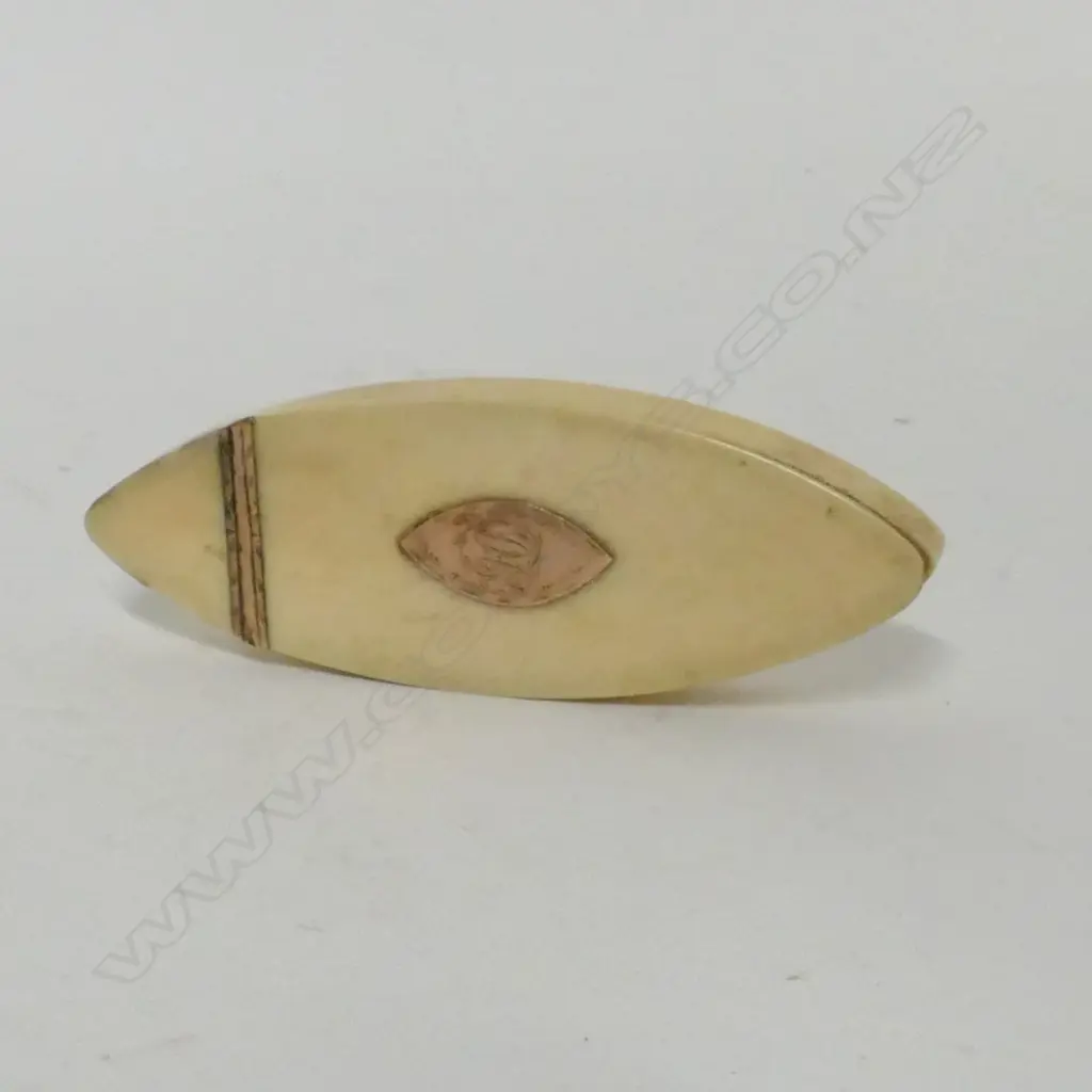 A Georgian ivory and gold mounted boat shaped tooth pick box Image 1++