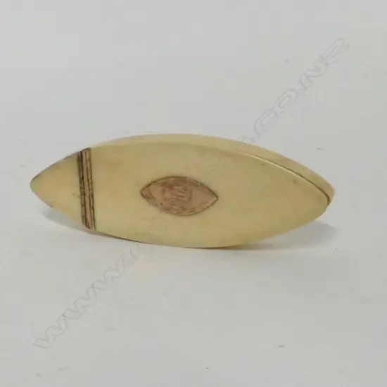 A Georgian ivory and gold mounted boat shaped tooth pick box