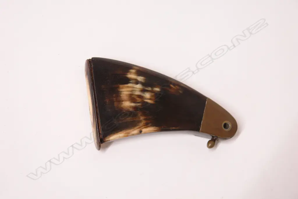 A 19thC pressed horn priming powder/snuff flask Image 1++