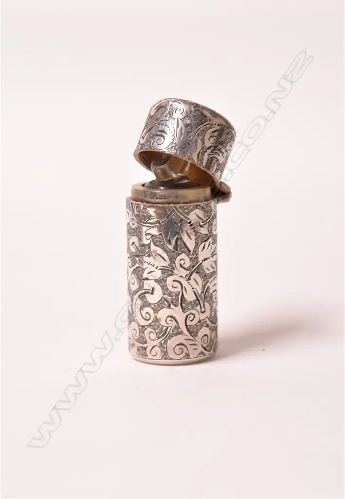 A late Victorian silver cylinder scent bottle Image 1++