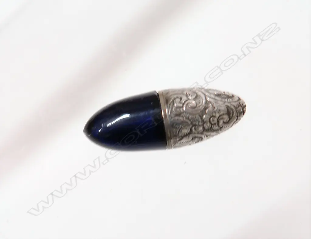 A late Victorian silver and Bristol blue glass egg form scent bottle Image 1++