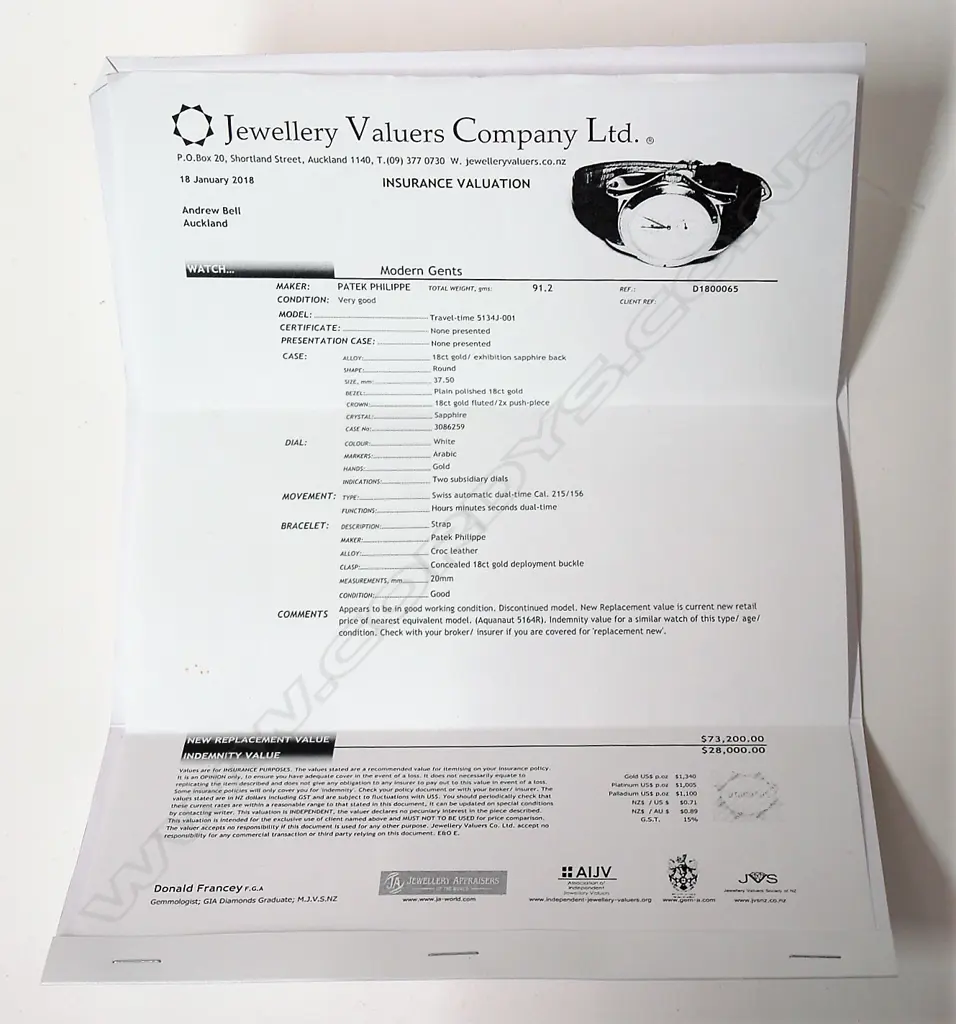 A modern gent's Patek Philippe Travel-Time 5134J 18ct. gold wristwatch Image 1++