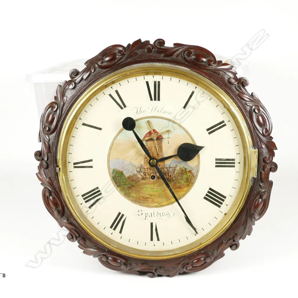 A 19thC mahogany fusée wall clock with leaf and scroll carved decoration Image 1++