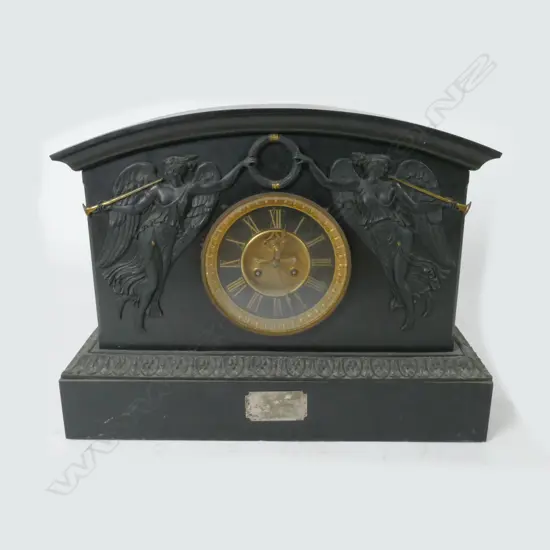 A substantial Victorian black marble mantel clock