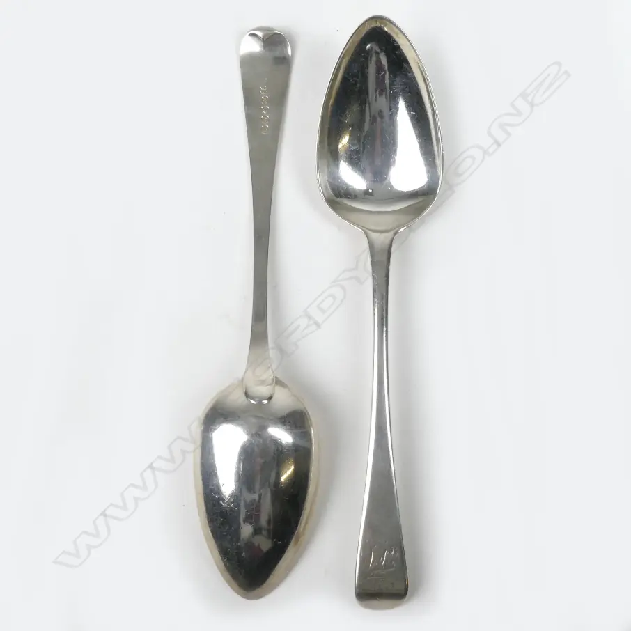 A pair of George III crested Old English silver tablespoons Image 1++