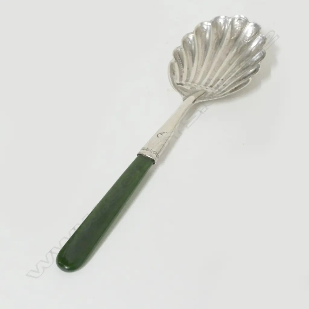 An early 1900s silver caddy spoon Image 1++