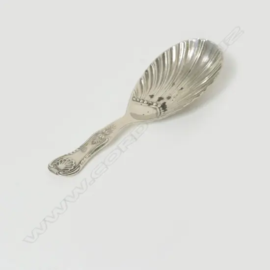 An early 1900s silver caddy spoon
