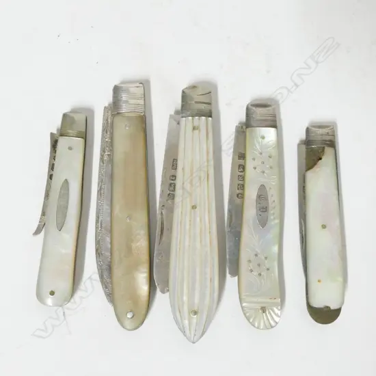 A collection of five mother-of-pearl and silver folding fruit knives