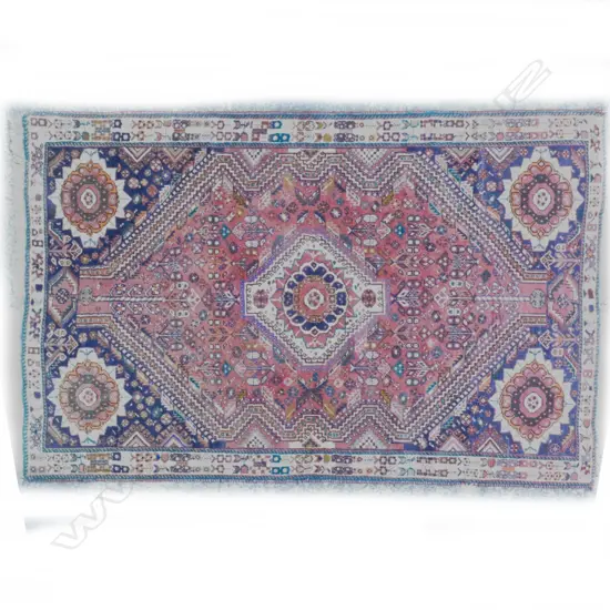 A hand knotted Persian Tribal Shiraz rug