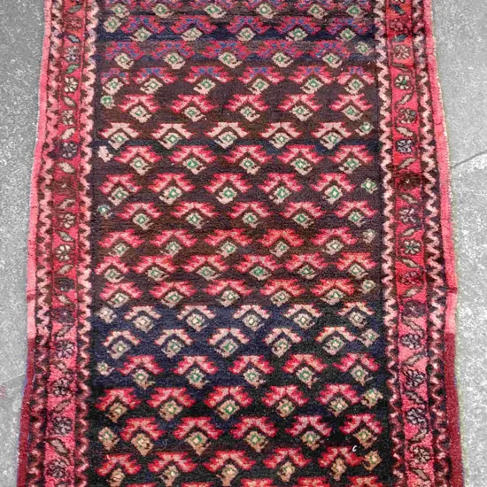 A hand knotted Persian Hamadan rug
