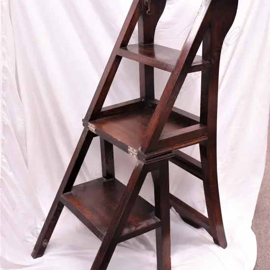 An early 20thC oak metamorphic chair/step stool