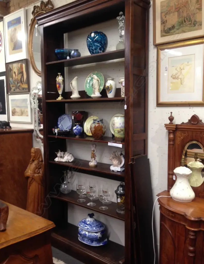 A tall oak Sefton Powrie bookcase Image 1++