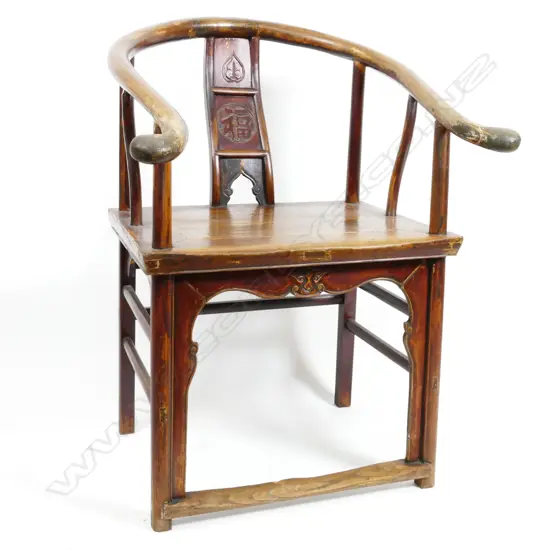 A pair of Chinese elm bow-back armchairs