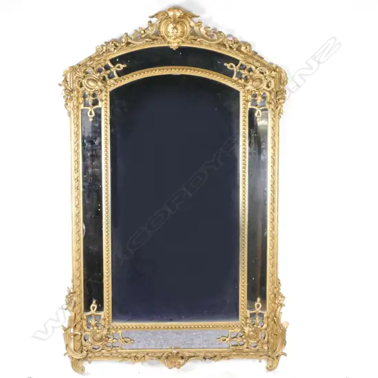 A large French style gilt framed mirror