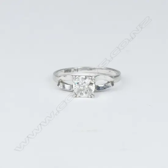 A 22ct. white gold and diamond solitaire ring
