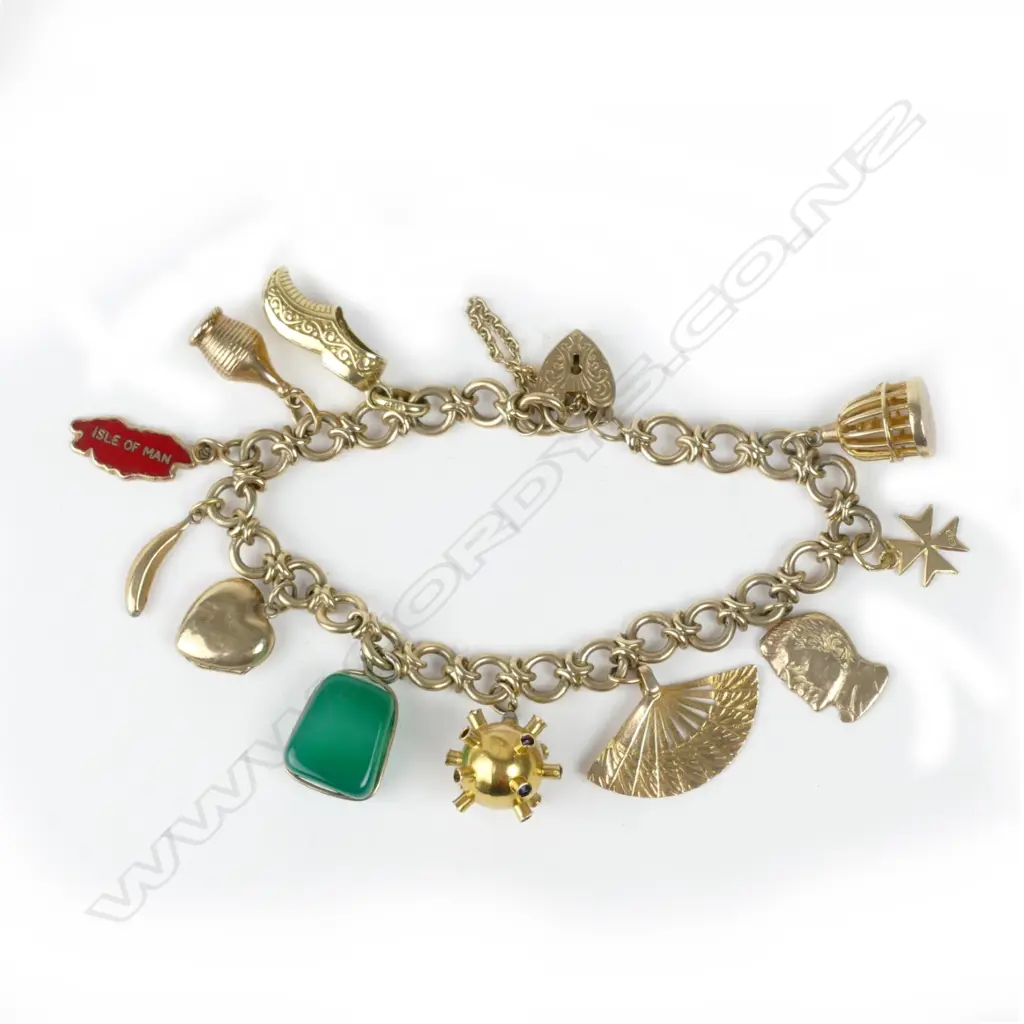 A 9ct. gold charm bracelet Image 1++