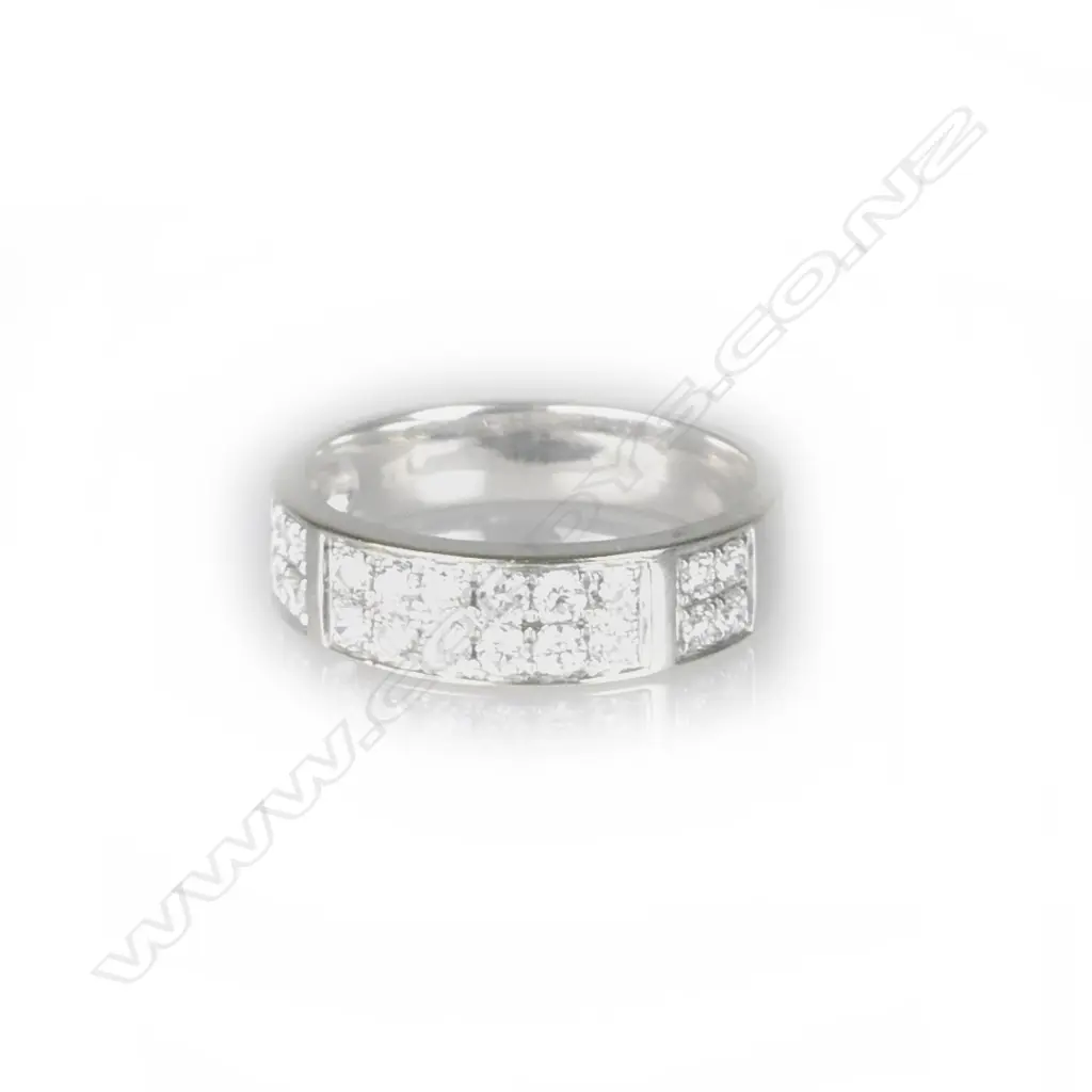 An 18ct. white gold and multi diamond band ring Image 1++