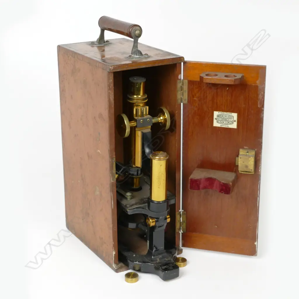 A Victorian brass and ebonised metal monocular microscope Image 1++
