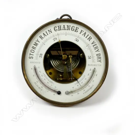 An Edwardian wall mounted aneroid barometer