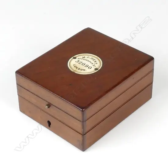 A mahogany triple-layer case for a deck watch