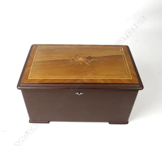 A Swiss music box with 6" cylinder and three 'bells in sight'